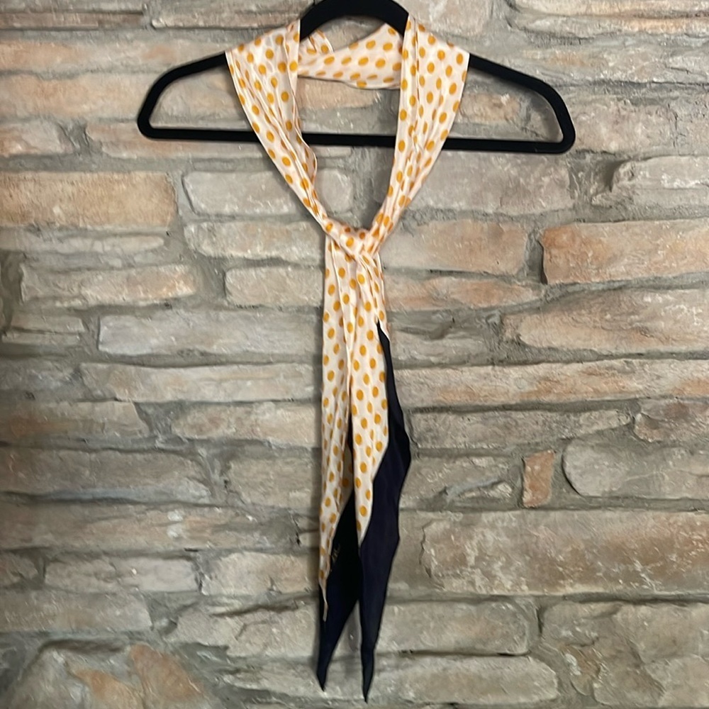Anne Klein orange and white polkadot 100% silk scarf with navy blue trim.
